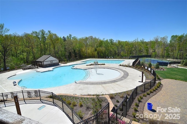 2333 Talon Point Cir, Fort Mill, SC 29715 - community pool featuring fence, a forest view, and a patio area
