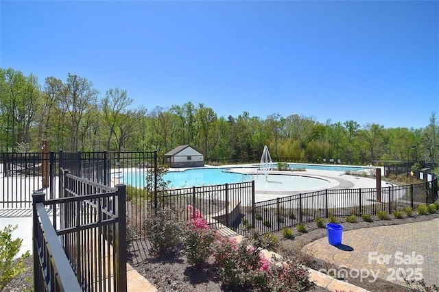 2333 Talon Point Cir, Fort Mill, SC 29715 - community pool featuring fence, a patio area, and a wooded view
