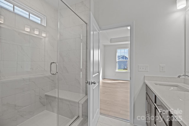 124 Canary Ln Unit 7, Mooresville, NC 28115 - bathroom with a shower stall, double vanity, and baseboards