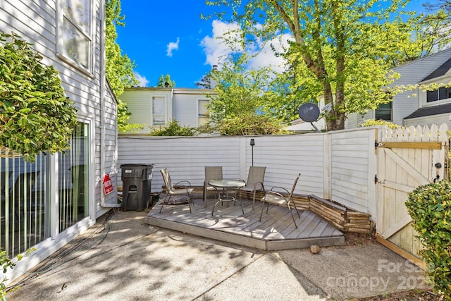 7407 Mystic Ln, Charlotte, NC 28227 - view of patio / terrace featuring a gate, fence, and a deck