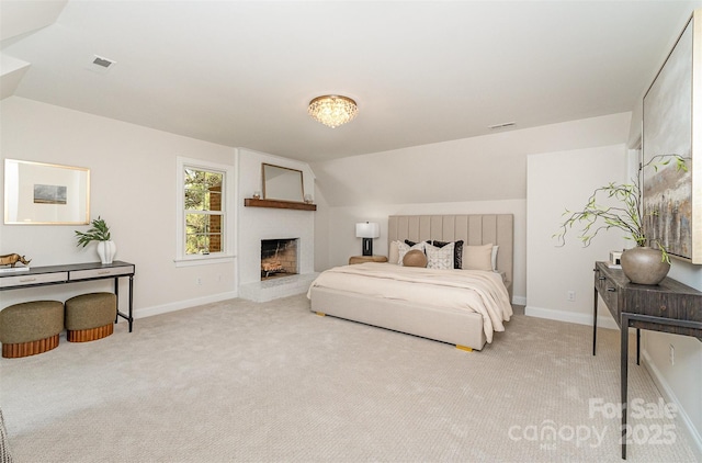 426 Walden Trl, Waxhaw, NC 28173 - bedroom with baseboards, light carpet, vaulted ceiling, and visible vents
