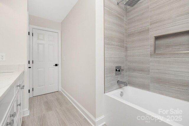 426 Walden Trl, Waxhaw, NC 28173 - full bathroom with baseboards, shower / bathtub combination, and vanity
