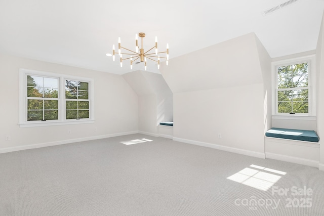 426 Walden Trl, Waxhaw, NC 28173 - additional living space featuring an inviting chandelier, carpet floors, baseboards, vaulted ceiling, and visible vents