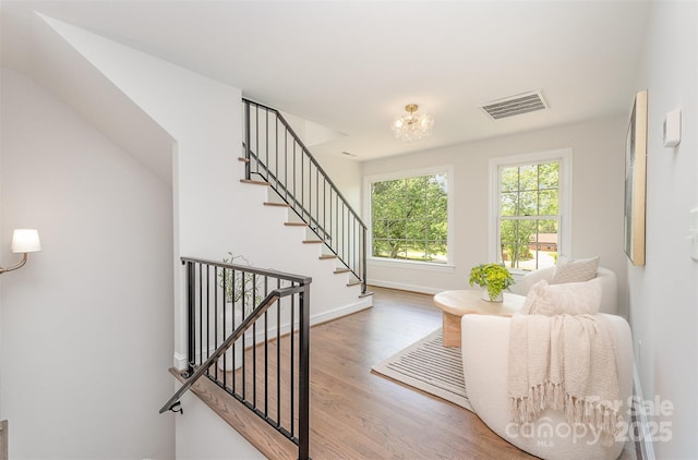 426 Walden Trl, Waxhaw, NC 28173 - interior space featuring visible vents, baseboards, wood finished floors, and a notable chandelier