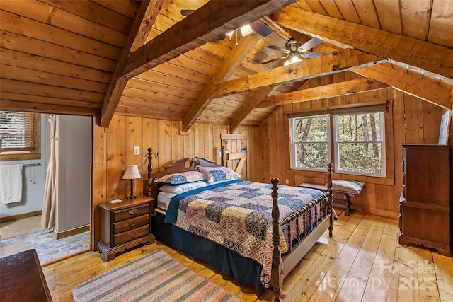 bedroom with wooden walls, light wood finished floors, wooden ceiling, and lofted ceiling with beams