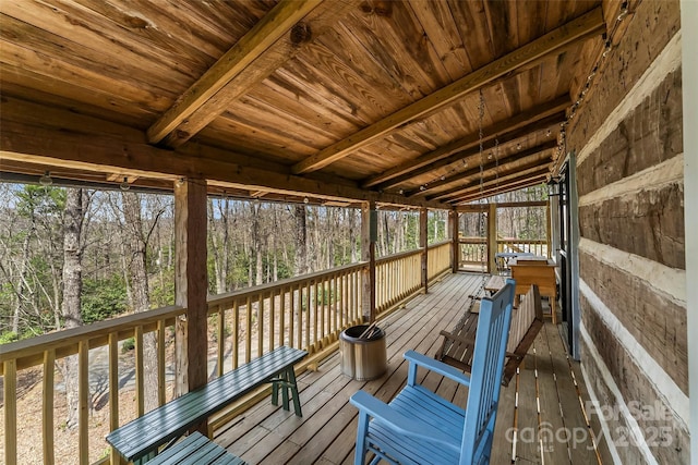 sunroom / solarium with beam ceiling