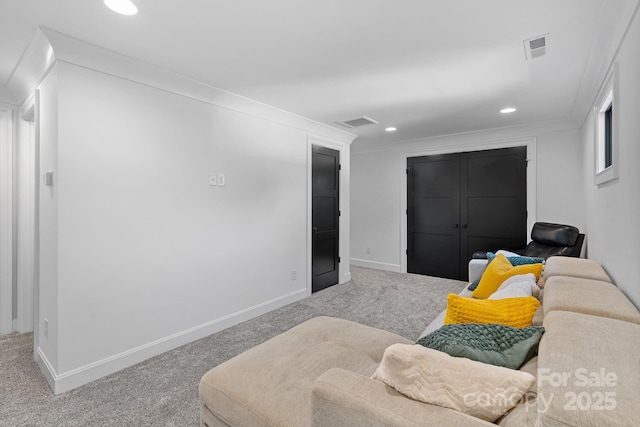 carpeted living room featuring baseboards, visible vents, and recessed lighting