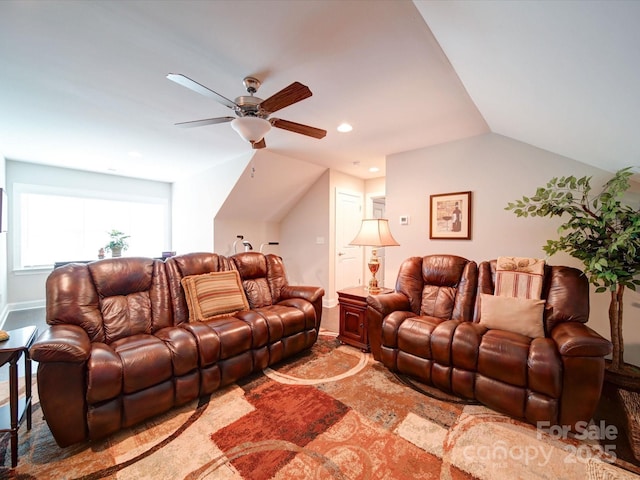 living room featuring vaulted ceiling, baseboards, recessed lighting, and ceiling fan