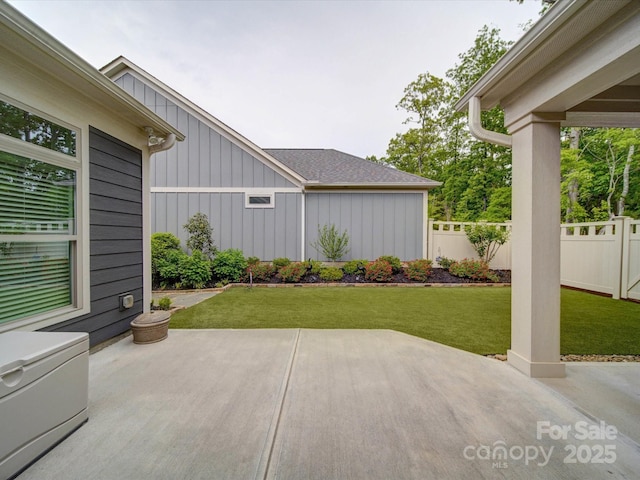 view of patio / terrace featuring fence