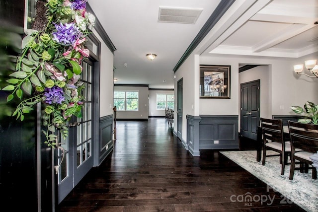 10707 Charmont Pl, Huntersville, NC 28078 - hall featuring ornamental molding, a chandelier, and dark wood-type flooring