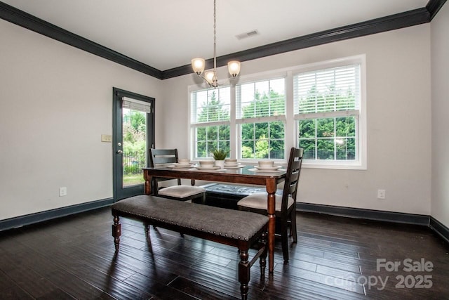 10707 Charmont Pl, Huntersville, NC 28078 - dining space with crown molding, baseboards, dark wood-style flooring, and a chandelier