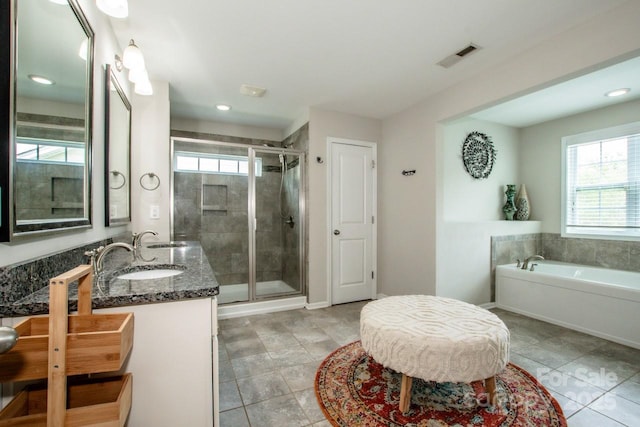 10707 Charmont Pl, Huntersville, NC 28078 - full bathroom with a stall shower, tile patterned flooring, a bath, vanity, and recessed lighting