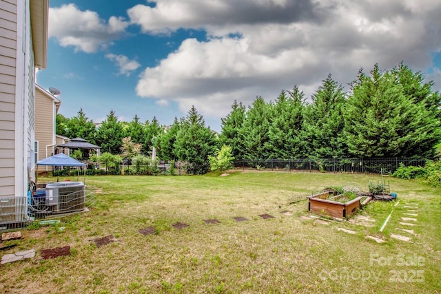 10707 Charmont Pl, Huntersville, NC 28078 - view of yard featuring a vegetable garden, central AC unit, and a gazebo