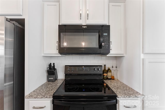 548 Dutch White Dr, Clover, SC 29710 - kitchen with black appliances, white cabinets, and tasteful backsplash