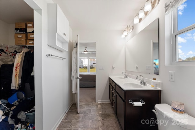 548 Dutch White Dr, Clover, SC 29710 - bathroom with ensuite bathroom, stone finish flooring, a ceiling fan, baseboards, and double vanity
