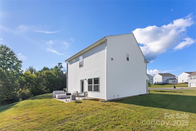 548 Dutch White Dr, Clover, SC 29710 - back of property featuring outdoor lounge area, a lawn, and a patio area