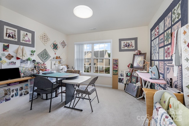 dining space with carpet flooring and visible vents