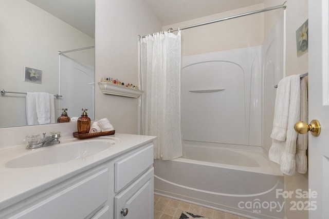 bathroom with shower / bath combo and vanity