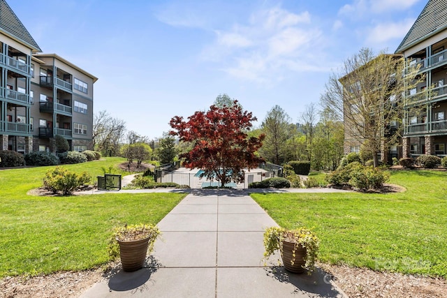 view of community featuring a lawn