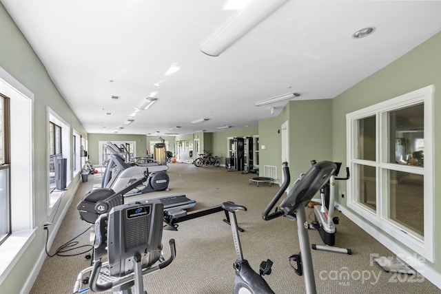 workout area featuring carpet floors and visible vents