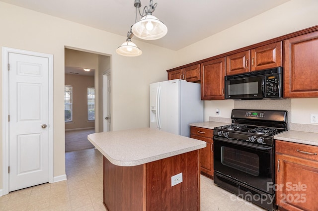 kitchen featuring a center island, hanging light fixtures, black appliances, light floors, and light countertops