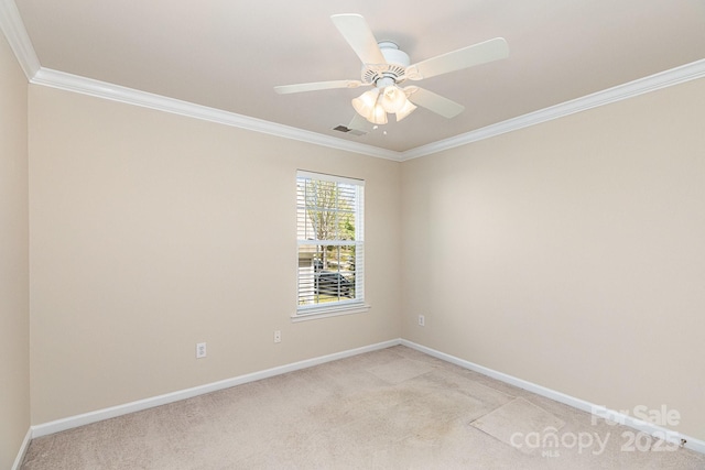 empty room with visible vents, crown molding, baseboards, and light carpet