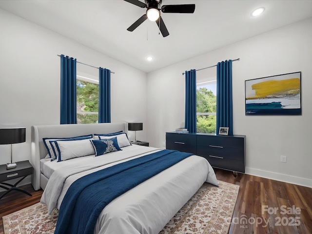 bedroom with wood finished floors, baseboards, recessed lighting, and a ceiling fan