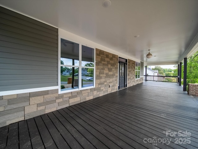 wooden terrace with covered porch