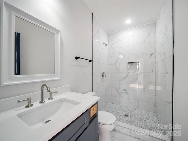 bathroom featuring marble look tile flooring, toilet, a shower stall, vanity, and recessed lighting