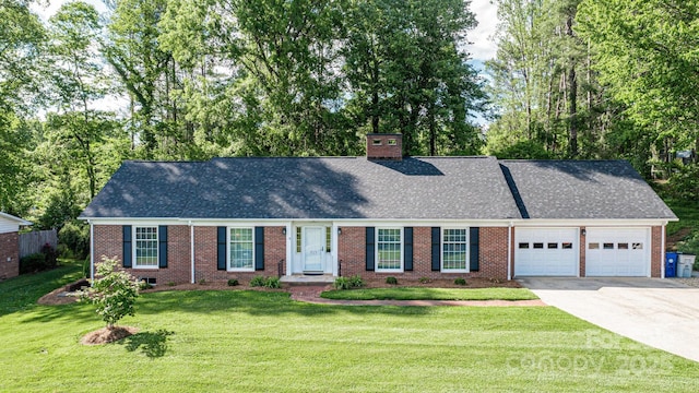 view of front of home with a garage, roof with shingles, and brick siding