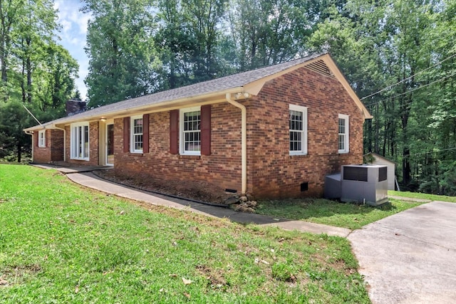 182 Freedom Mill Rd, Gastonia, NC 28052 - ranch-style home featuring a front yard, crawl space, central AC, and brick siding