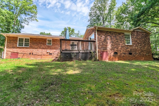 182 Freedom Mill Rd, Gastonia, NC 28052 - back of property with a yard, a wooden deck, crawl space, and brick siding