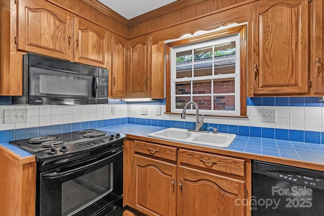 182 Freedom Mill Rd, Gastonia, NC 28052 - kitchen with black appliances, decorative backsplash, tile countertops, and a sink