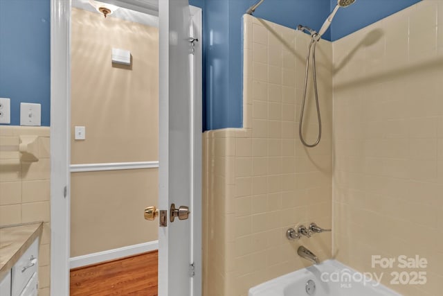 182 Freedom Mill Rd, Gastonia, NC 28052 - full bath with wood finished floors, shower / tub combination, and vanity