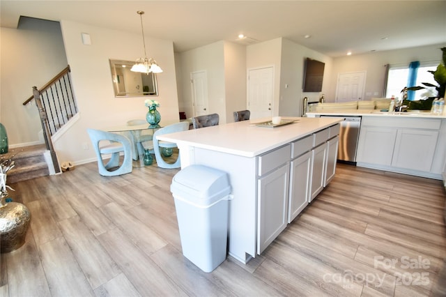 525 San Marco Dr, Gastonia, NC 28056 - kitchen with a center island, a sink, light wood-type flooring, dishwasher, and recessed lighting