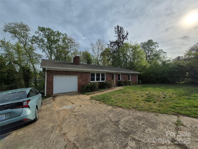 single story home with a chimney, driveway, brick siding, a front yard, and a garage