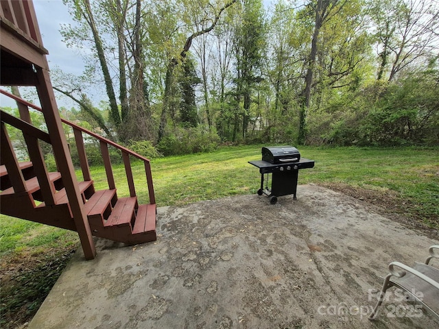view of patio featuring stairs and area for grilling
