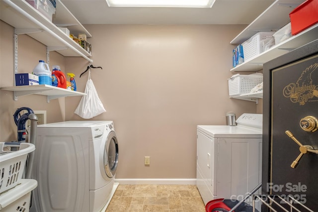 106 S Oakwood Dr, Kings Mountain, NC 28086 - laundry area featuring washing machine and dryer, baseboards, and laundry area