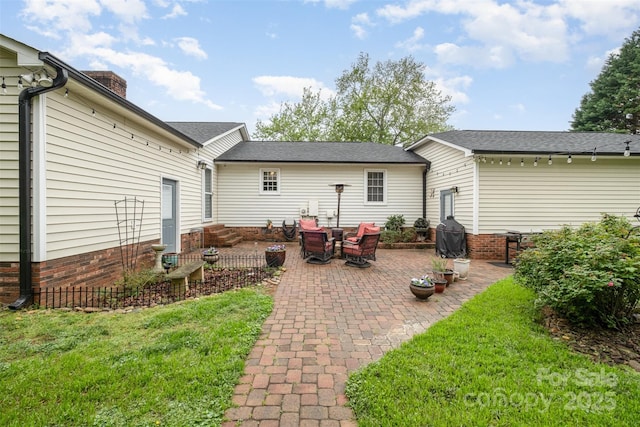 106 S Oakwood Dr, Kings Mountain, NC 28086 - back of property featuring a patio area, a chimney, entry steps, and a yard