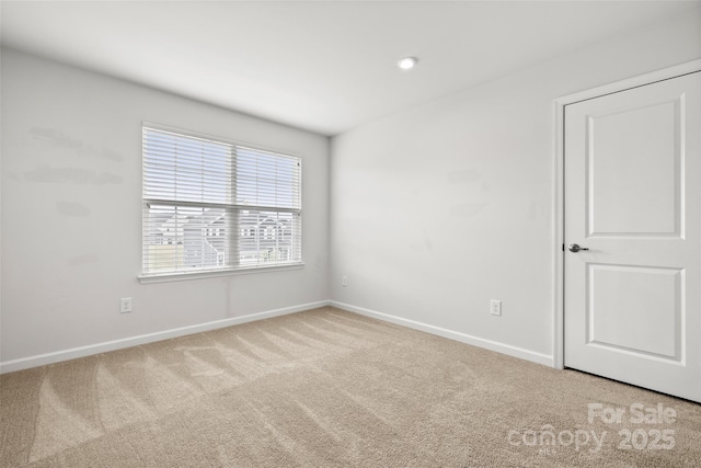 1933 Tin Roof Ln, Monroe, NC 28112 - carpeted empty room with recessed lighting and baseboards
