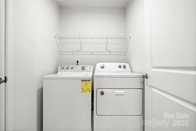 1933 Tin Roof Ln, Monroe, NC 28112 - laundry room with laundry area and washing machine and dryer