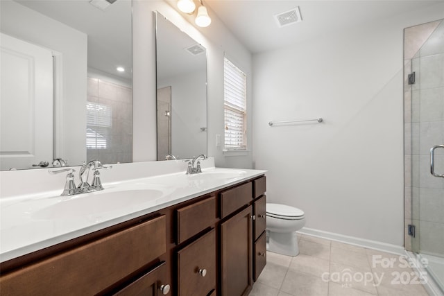 1933 Tin Roof Ln, Monroe, NC 28112 - full bath with visible vents, a shower stall, tile patterned flooring, and a sink