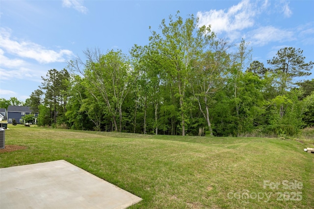 1933 Tin Roof Ln, Monroe, NC 28112 - view of yard with central AC unit and a patio area