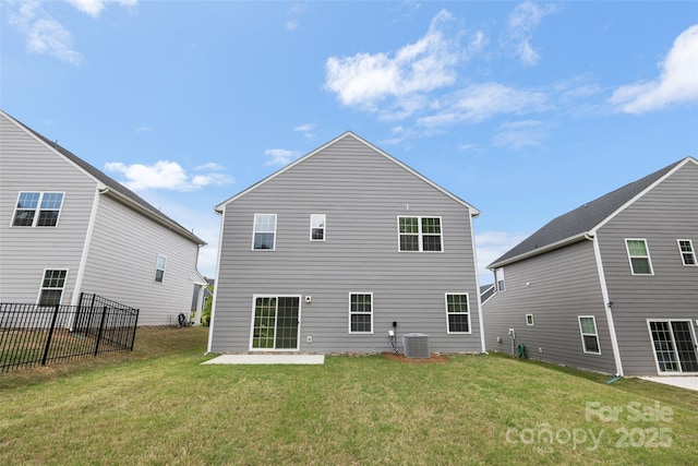 1933 Tin Roof Ln, Monroe, NC 28112 - back of house with central AC, fence, a yard, and a patio area