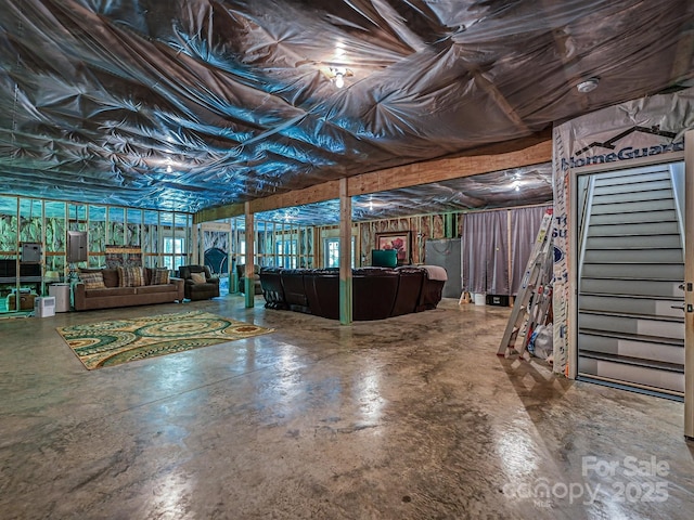 basement featuring stairs
