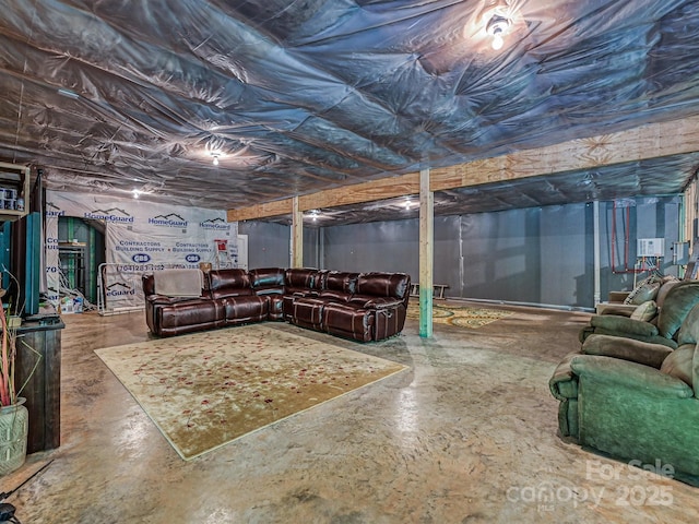 living room featuring concrete flooring