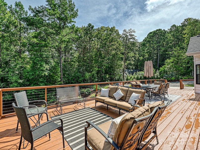 deck with an outdoor hangout area and outdoor dining area