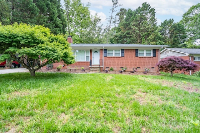 4920 Raymond Pl, Charlotte, NC 28205 - single story home featuring crawl space, brick siding, a chimney, and entry steps