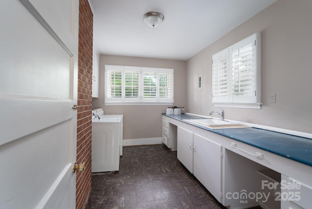 4920 Raymond Pl, Charlotte, NC 28205 - laundry room featuring washing machine and dryer, cabinet space, and baseboards