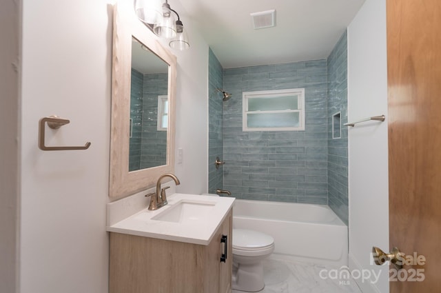 4920 Raymond Pl, Charlotte, NC 28205 - bathroom with vanity, toilet, tub / shower combination, and marble look tile flooring